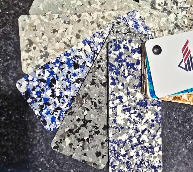 Flake epoxy flooring installation in Naples, FL by Top Quality Coating featuring durable, stylish, and low-maintenance poly flake epoxy for residential and commercial spaces.