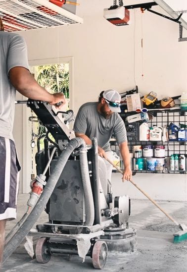 Top Quality Coating crew applying epoxy floor coating in Naples FL.