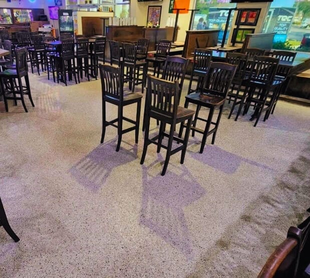 Commercial epoxy flooring installed in a Marco Island restaurant kitchen by Top Quality Coating.