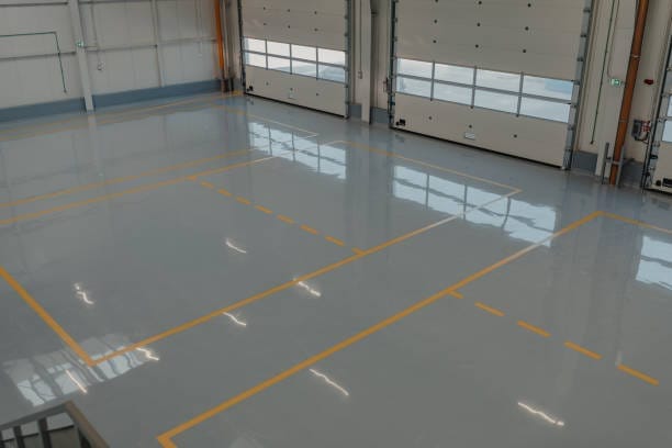 Solid color epoxy garage floor installation by Top Quality Coating in Naples, FL.